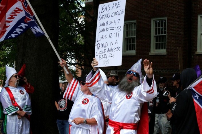 Medlemmer av Ku Klux Klan demonstrerer for krigsmonumenter i Charlottesville, Virginia i juli i år. (Foto: Reuters /NTB scanpix) Medlemmer av Ku Klux Klan demonstrerer for krigsmonumenter i Charlottesville, Virginia i juli i år. (Foto: Reuters /NTB scanpix)